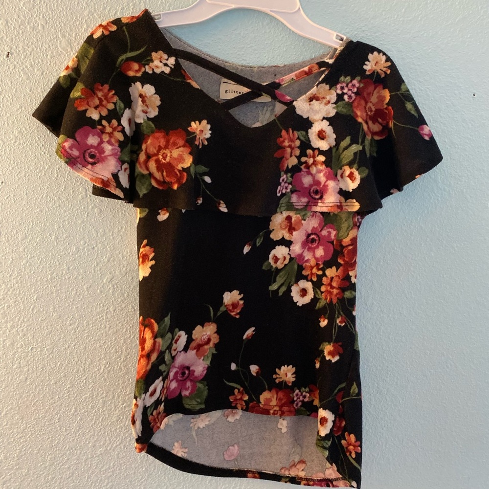 Blacks flowered shirt with cropped front.